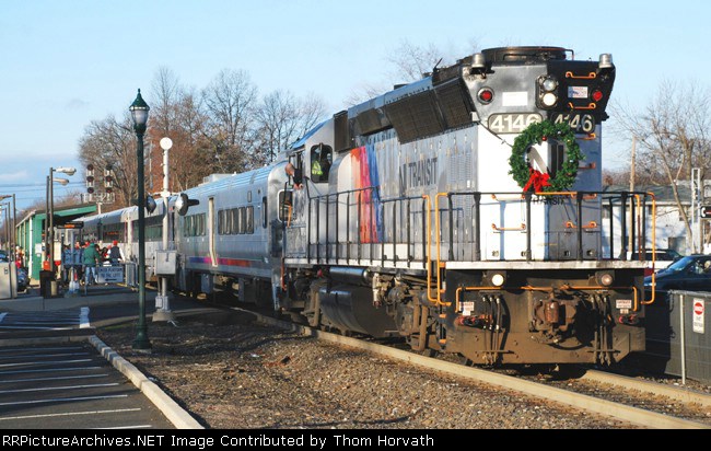 NJT's Santa Claus train is seen picking up passengers